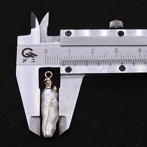 Baroque pearl pendant with gold bail measured at 30mm length with a caliper