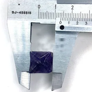Macro shot showing 12mm width measurement of a purple amethyst geometric crystal cube