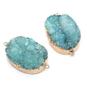 Set of two oval blue crystal quartz connectors with gold plated edges for DIY jewelry