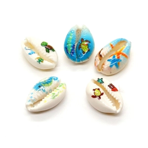 Hand-painted natural shells featuring colorful sea turtle, starfish, and octopus patterns