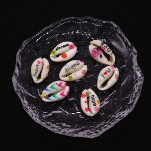 Natural sea shell beads with colorful floral patterns and inspirational text for DIY jewelry