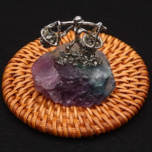 Creative amethyst crystal miner ornament featuring a natural fluorite stone on a woven base