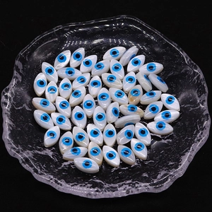Natural shell beads with blue evil eye pattern for DIY jewelry making and crafts