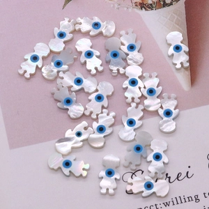 Natural seashell girl shaped beads with blue evil eye detail for DIY jewelry making