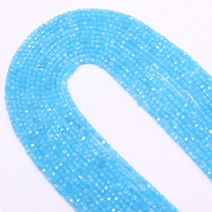 Macro detail of 2.5mm sky blue faceted cube stone beads for DIY jewelry making