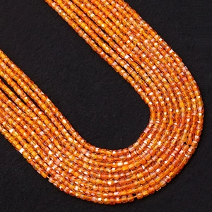 Macro shot of 2-3mm faceted orange natural stone beads for DIY jewelry making
