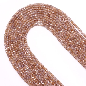 Detailed view of 2.5mm faceted square champagne zircon beads for DIY jewelry making