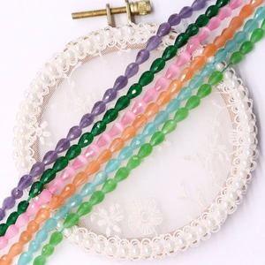 Faceted teardrop cat eye beads in various colors for DIY jewelry making and crafts