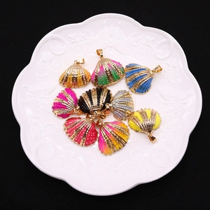 Set of eight colorful scallop shell pendants with gold plated edges for DIY jewelry making