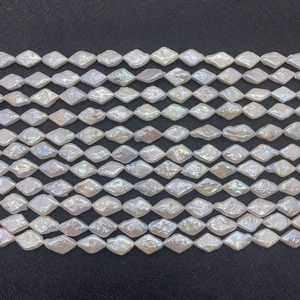 Macro detail of natural freshwater baroque pearls in rhombus shape for DIY jewelry