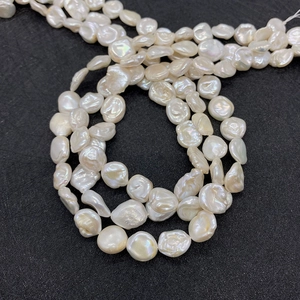 Rangs de perles d'eau douce baroques blanches de 9-10mm avec éclat irisé pour bijoux