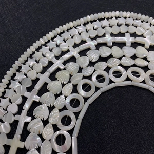 Natuurlijke parelmoer kralen in ster hart en visvorm voor DIY sieraden maken