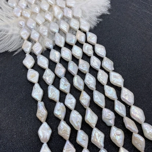 Strands of 10x15mm rhombus-shaped baroque freshwater pearls with high luster and white glow