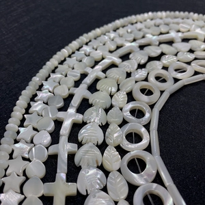 Natuurlijke parelmoer kralen in ster hart en bloemvorm voor DIY sieraden maken ontwerp