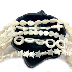 Natuurlijke schelpkralen in blad- en stervorm voor DIY-kettingen en sieraden maken