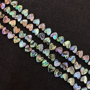 Hartvormige natuurlijke abalone schelpkralen met iriserende glans voor DIY sieraden