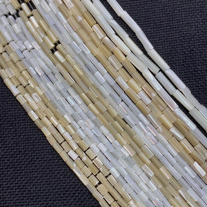 Perline cilindriche in madreperla naturale per creazione gioielli crema e champagne