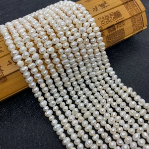 Natural freshwater white pearls on bamboo mat for jewelry making DIY necklaces