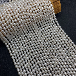 Perles d'eau douce blanches naturelles avec lustre doux pour création de bijoux