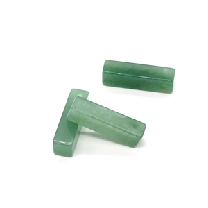 Macro shot of green aventurine rectangular stone pendants showing natural mineral textures