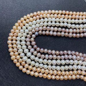 Natural AAA freshwater pearl strands in white, pink, and purple for DIY jewelry making