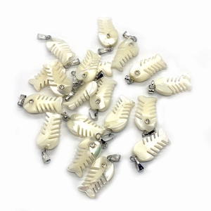 Natural sea shell fishbone pendant with shimmering mother of pearl and silver metal clasp
