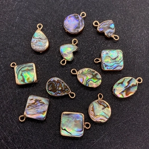 Pendentifs en nacre d'abalone naturelle en forme de cœur avec bordure dorée