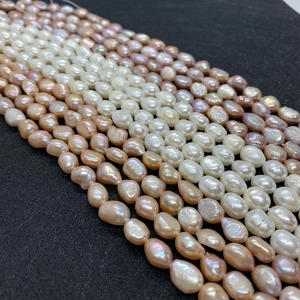 Detailed close-up of multi-colored Grade A natural freshwater baroque pearls in high luster