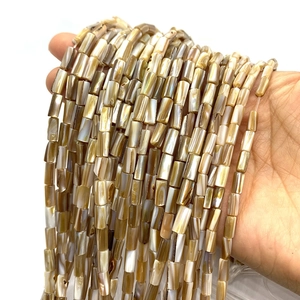 Natural shell cylindrical beads in mixed brown and white tones for DIY jewelry making