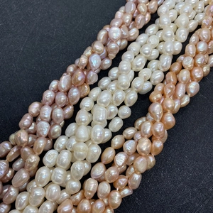 Detailed view of multi-color baroque freshwater pearl strands for DIY jewelry making
