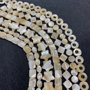 Cuentas de nácar natural en forma de estrella y geométricas para creación de joyas