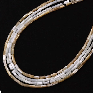 Natural sea shell cylindrical beads strands in white and champagne with iridescent pearl luster