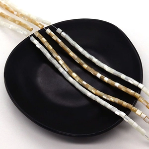 Natuurlijke cilindrische schelpkralen in beige en crème voor DIY-kettingen en sieraden maken