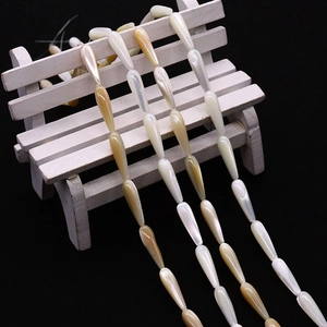 Natural teardrop mother of pearl beads in creamy white and gold for DIY jewelry making