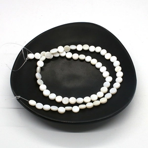 Platte ronde witte zoetwater schelpkralen met parelglans voor DIY sieraden maken hobby