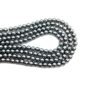 Gefacetteerde donkergrijze metalen kralen in rijen voor het maken van DIY-sieraden