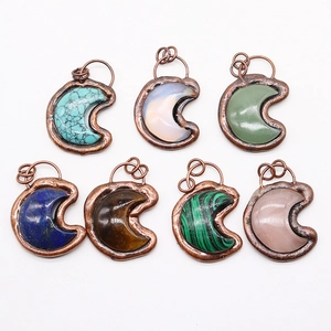 Set of seven moon-shaped natural stone pendants with vintage copper plated edges