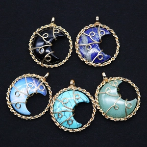 Set of natural crystal pendants with wire-wrapped moon charms in various gemstones