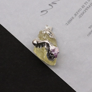 Natural raw quartz pendant with irregular silver metal plating and purple crystal accent