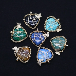Set of heart-shaped natural stone pendants with wire wrap and gold butterfly charms
