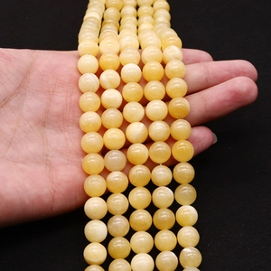 Handheld natural beige stone beads in round shape for DIY jewelry making