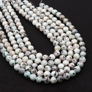 Perles rondes en pierre naturelle vert clair avec points noirs pour créer bijoux