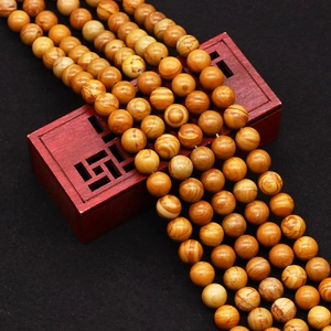 Perles rondes en pierre à grain de bois jaune pour collier et bijoux faits à la main