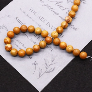 S-shaped strand of natural picture jasper round beads with yellow and brown wood grain texture