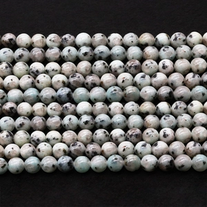 Perles en jaspe naturel poli avec taches bleues et noires pour création de bijoux