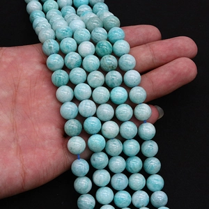 Handheld strand of natural light blue amazonite round beads with smooth polished finish