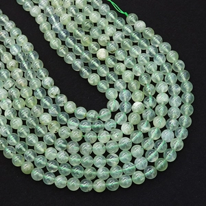 Perline tonde in prehnite naturale verde con inclusioni per la creazione di gioielli