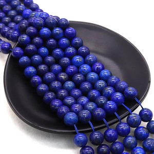 Polished natural Lapis Lazuli round beads in deep blue with golden pyrite inclusions