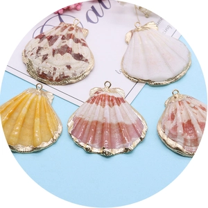 Pendentifs en coquillage naturel avec bords dorés pour la création de bijoux