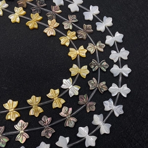 Natürliche Meeresschneckenperlen in Schleifenform für DIY-Schmuck in Weiß Gelb und Schwarz